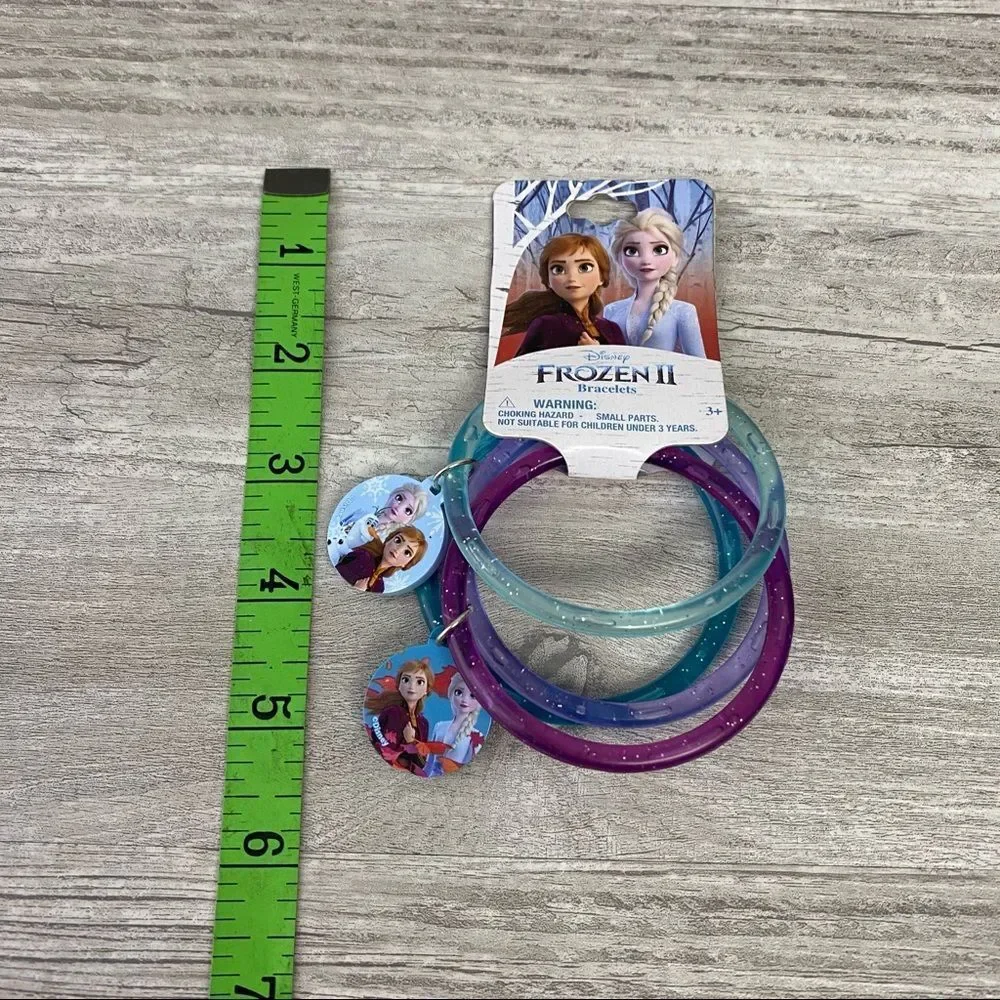 NWT Frozen II three piece bracelet with charms